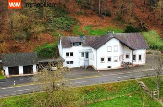 Haus kaufen in 54347 Neumagen-Dhron, Modernisiert und geräumig! Geteiltes Zweifamilienhaus mit tollem Grundstück in Alleinlage!