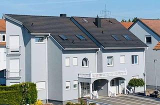 Mehrfamilienhaus kaufen in 76344 Eggenstein-Leopoldshafen, Erstklassiges Renditeobjekt in Top-Lage von Eggenstein! Mehrfamilienhaus mit Stellplätzen und Garage