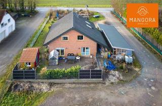 Einfamilienhaus kaufen in 28844 Weyhe, Charmantes Einfamilienhaus mit vielseitigen Nutzungsmöglichkeiten – Perfekt für Handwerker oder Fami