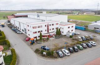 Gewerbeimmobilie kaufen in Petersäcker -, 74936 Siegelsbach, Vermietetes Gewerbegrundstück mit Büroflächen und großen Hallen