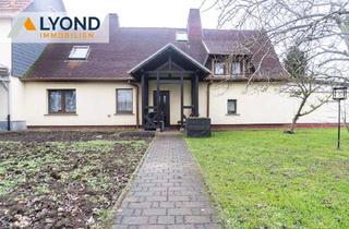 Haus kaufen in 99887 Hohenkirchen, Charmantes Zwei-Familien-Haus mit großzügigem Grundstück und vielseitigem Potenzial