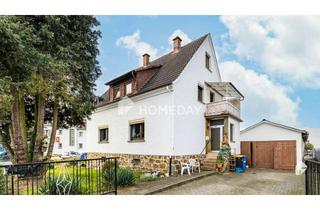 Einfamilienhaus kaufen in 35641 Schöffengrund, Einfamilienhaus mit großem Garten in Schwalbach
