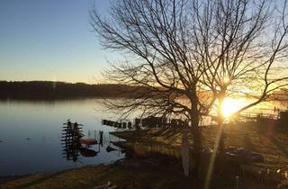 Wohnung kaufen in Steinwarder, 23774 Heiligenhafen, RESERVIERT!!! Traum-Wohnung direkt am See mit Süd-Terasse und Garten in Heiligenhafen an der Ostsee
