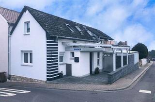 Einfamilienhaus kaufen in 55270 Essenheim, Charmantes Einfamilienhaus in Essenheim – wie 2 Wohnungen in einem