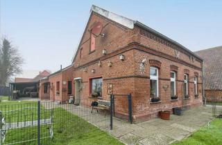 Haus kaufen in Trappenweg, 26847 Detern, Großzügiges Zuhause mit Garten, Garage und Doppelcarport in naturnaher Lage