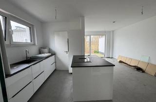 Wohnung kaufen in Im Grund B, 49186 Bad Iburg, Extravagante Neubau-ETW über zwei Ebenen in ruhiger Grünlage von Bad Iburg