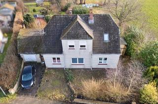 Haus kaufen in Bahnhofstraße, 24619 Tarbek, Tarbek: Großes, teilmodernisiertes Ein- /Zweifamilienhaus in ruhiger, aber verkehrsgünstiger Lage