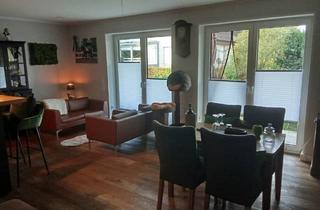Wohnung kaufen in 26203 Wardenburg, Wardenburg - Moderne Zwei-Zimmer-Erdgeschosswohnung mit großer Terrasse und Garten in Wardenburg