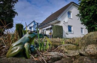 Einfamilienhaus kaufen in 19073 Klein Rogahn, Klein Rogahn - Einladendes Einfamilienhaus mit Koikarpfen-Naturteich und unverbauten Weitblick