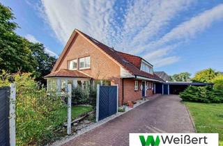 Haus kaufen in 25767 Tensbüttel-Röst, Tensbüttel-Röst - Exklusives Mehrgenerationshaus mit drei Wohneinheiten und 450 m² Wohnfläche auf traumhaftem Grundstück