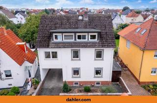 Mehrfamilienhaus kaufen in 64546 Mörfelden-Walldorf, Mehrfamilienhaus mit Gartenidylle und Entwicklungspotenzial