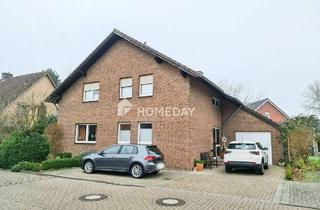 Haus kaufen in 48268 Greven, Greven - Vermietete Erbpachtimmobilie: Zweifamilienhaus mit Balkon, Terrasse und Garage in Greven