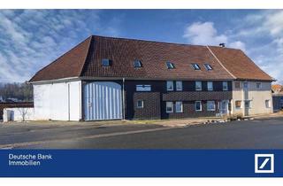 Mehrfamilienhaus kaufen in 37412 Herzberg, Herzberg - Attraktives Mehrfamilienhaus mit drei vermieteten Einheiten, zwei Garagen, großem Garten und Scheune