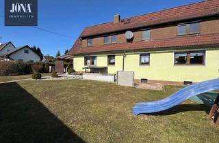 Doppelhaushälfte kaufen in 95352 Marktleugast, Wohnimmobilie mit großem Garten und Doppelgarage in einem angenehm ruhigen Umfeld