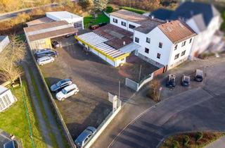 Anlageobjekt in Bahnhofstraße 98, 35510 Butzbach, Großzügiges Wohnhaus mit Werkstatt in Butzbach-Kirch-Göns