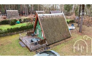 Grundstück zu kaufen in 16831 Rheinsberg, 983m² mit Finnhütte + Bootsliegeplätze + ca. 6.000m² Wassergemeinschaftsgrundstück