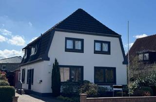 Haus kaufen in 24855 Jübek, Renditestarkes und umfangreich modernisiertes Zweifamilienhaus im Zentrum von Jübek