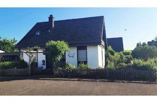 Einfamilienhaus kaufen in 55619 Hennweiler, Freistehendes Einfamilienhaus mit Garten, Garage und Carport in ruhiger Lage