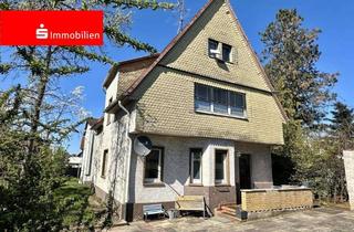 Haus kaufen in 63075 Waldheim, Sanierungsbedürftiges 2-Familienhaus mit Garage und schönem Grundstück