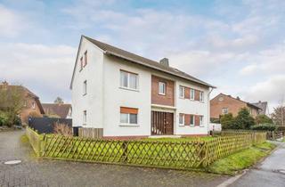 Mehrfamilienhaus kaufen in Seitweg, 59427 Unna, Attraktives Mehrfamilienhaus mit drei Wohneinheiten, Garten und Garagen in ruhiger Lage von Unna-Hem