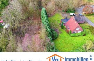 Haus kaufen in Wittmunder Straße 83, 26639 Wiesmoor, Sanierungsbedürftiges Wohnhaus mit Baugrundstück und Waldfläche in der Blumenstadt Wiesmoor
