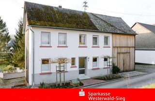 Haus kaufen in 57636 Sörth, Teilmodernisiertes Wohnhaus mit Werkstatt und großer Scheune