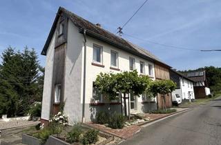Haus kaufen in 57636 Sörth, Teilmodernisiertes Wohnhaus mit Werkstatt und großer Scheune