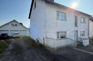 Haus kaufen in 34379 Calden, Gepflegtes 2 Familienhaus teilvermietet mit großem Grundstück in Calden/ Obermeiser