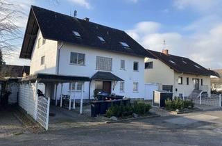 Wohnung kaufen in 61137 Schöneck, Wohlfühltraum mit Gartenanteil und Doppelcarport
