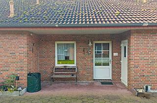 Haus kaufen in 26810 Westoverledingen, Für Investoren! Vermietetes Reihenmittelhaus mit Loggia in gepflegter Umgebung - kurz vor Papenburg