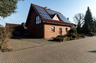 Haus kaufen in 49134 Wallenhorst, Charmantes Zweifamilienhaus in gewachsener Siedlung von Wallenhorst-Rulle