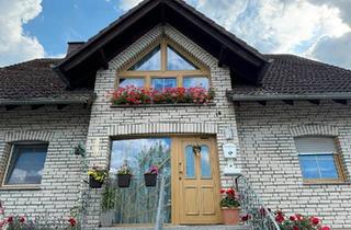 Einfamilienhaus kaufen in 55490 Gemünden, Gemünden - Einfamilienhaus mit ELW in gepflegten Zustand und ruhiger Umgebun