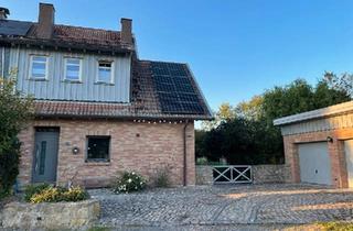 Doppelhaushälfte kaufen in 34414 Warburg, Warburg - Doppelhaushälfte mit großem Garten in Warburg-Menne