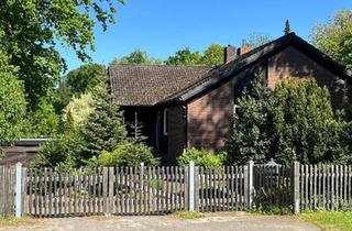 Einfamilienhaus kaufen in 29367 Steinhorst, Steinhorst - Großzügiger Winkelbungalow auf parkähnlichem Grundstück