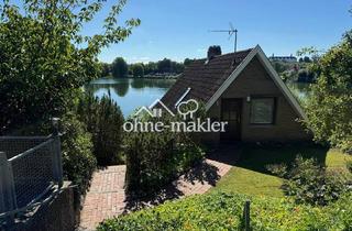 Einfamilienhaus kaufen in 24306 Plön, Einfamilienhaus mit ELW am Trentsee mit Schlossblick und Steg, provisionsfrei