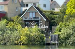 Einfamilienhaus kaufen in 24306 Plön, Einfamilienhaus mit ELW am Trentsee mit Schlossblick und Steg, provisionsfrei