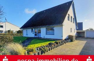 Haus kaufen in 25879 Süderstapel, Nur wenige Schritte bis zur Eider: Teilunterkellertes Wohnhaus mit Einliegerwohnung und zwei Garagen