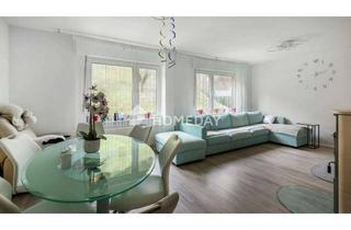Doppelhaushälfte kaufen in 65391 Sauerthal, Sanierte Doppelhaushälfte in ruhiger Hanglage mit Garten, Terrasse und Garage