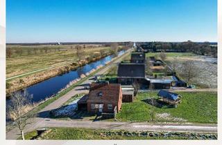Haus kaufen in 26639 Wiesmoor, Großzügiges Grundstück mit Haus direkt am Ems-Jade-Kanal