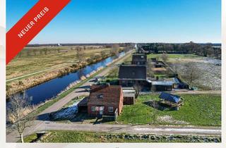 Haus kaufen in 26639 Wiesmoor, Großzügiges Grundstück mit Haus direkt am Ems-Jade-Kanal