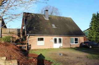 Haus kaufen in 24594 Wapelfeld, Vermietetes Zweifamilienhaus