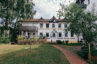 Haus kaufen in 24159 Pries, Charmantes Gartenhaus mit Terrasse und Balkon! Direkt an der Kieler Förde - Denkmalschutz
