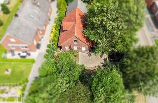 Haus kaufen in 26844 Jemgum, Wohnhaus mit zwei getrennten Wohnungen und großem Garten oder Baugrundstück