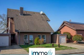 Haus kaufen in 52441 Linnich, Geräumiges Zweifamilienhaus in Linnich – Investment mit ausgebautem Dachgeschoss!