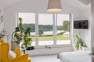 Mehrfamilienhaus kaufen in 24855 Bollingstedt, Mehrfamilienhaus mit Gestaltungsmöglichkeiten – Wohnen am See in idyllischer Lage