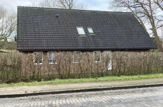 Einfamilienhaus kaufen in 25563 Wulfsmoor, Vermietetes Einfamilienhaus mit Einliegerwohnung
