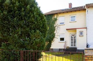 Haus kaufen in 64291 Darmstadt, Reihenendhaus mit Garage in schöner Lage von Darmstadt-Arheilgen