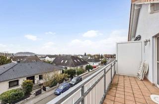 Wohnung kaufen in 35418 Buseck, Helle Dachgeschosswohnung mit Balkon in ruhiger Lage