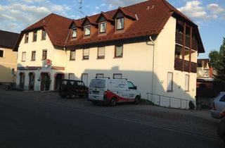 Wohnung kaufen in 68799 Reilingen, Aparte Eigentumswohnung mit 2 Zimmern in einem Wohn-und Geschäftshaus in Reilingen