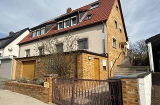 Doppelhaushälfte kaufen in 38350 Helmstedt, Doppelhaushälfte mit Garage, Garten und zwei Wohneinheiten in Helmstedt
